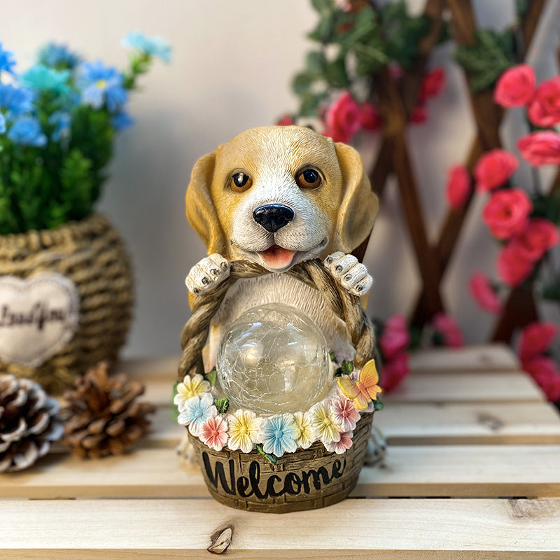Solcelledrevet LED-hagelampe «Puppies Welcome» laget av harpiks