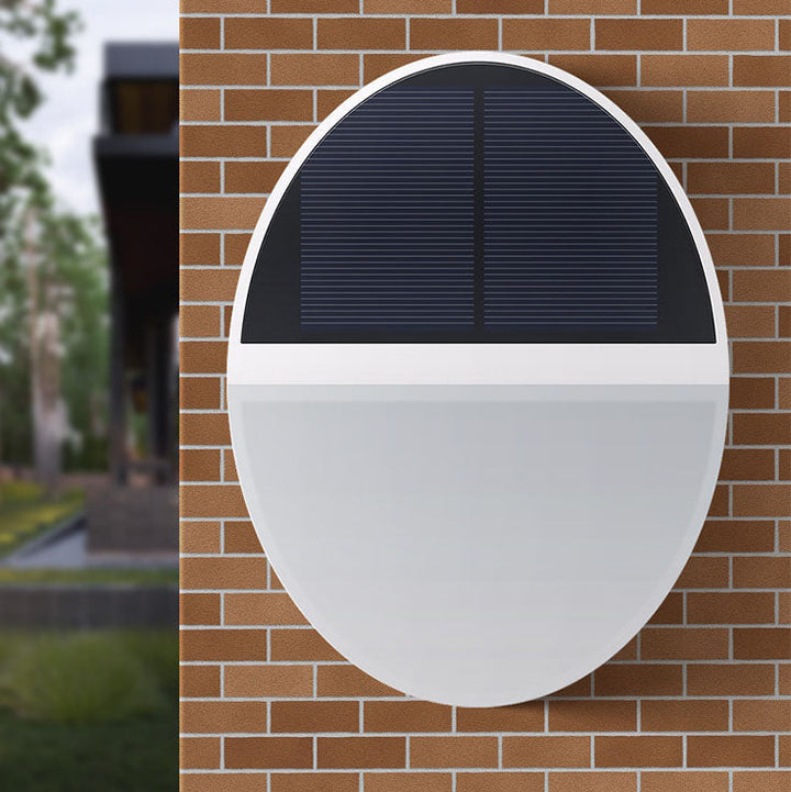 Soldrevet, vanntett, rund, flat LED-vegglampe med radarsensor for utendørs bruk