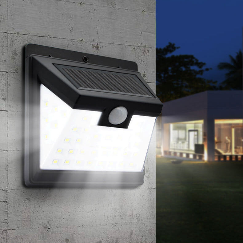 Utendørs solarpanel trapezoid kroppsensor vanntett LED patio vegglampe | Skanto