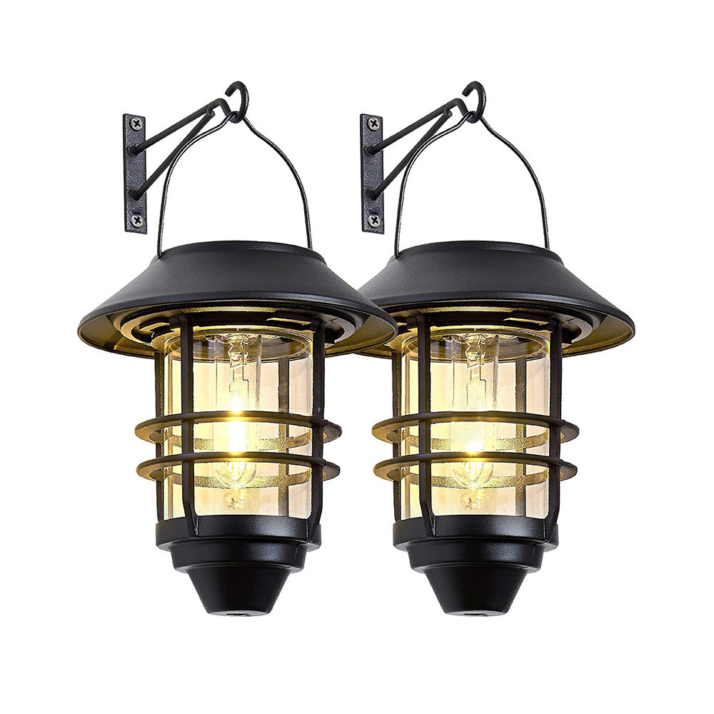 Moderne, retroinspirert, vanntett vegglampe laget av aluminium og glass med solcellefunksjon, sylindrisk, med én flamme, for oppheng på veggen til terrassen.