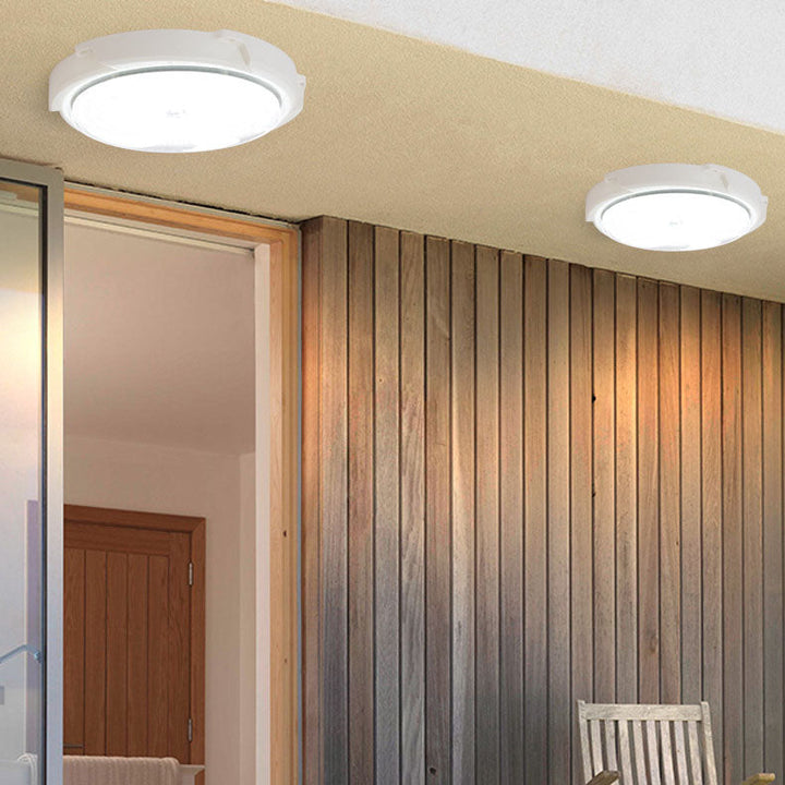 Moderne rund solcelledrevet LED-taklampe med fjernkontroll for innendørs og utendørs bruk