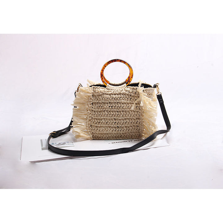 Håndlagd bast-crossbody-veske med fransedetaljer Skanto