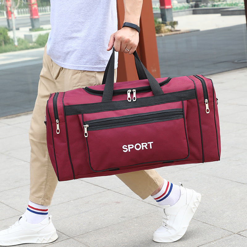 Sportlig reiseveske med robust design og flere rom Skanto