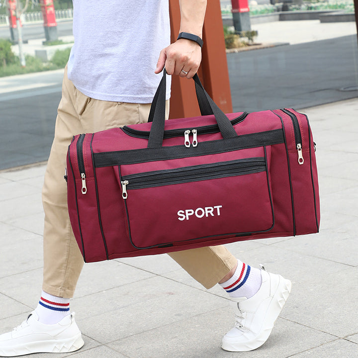 Sportlig reiseveske med robust design og flere rom Skanto