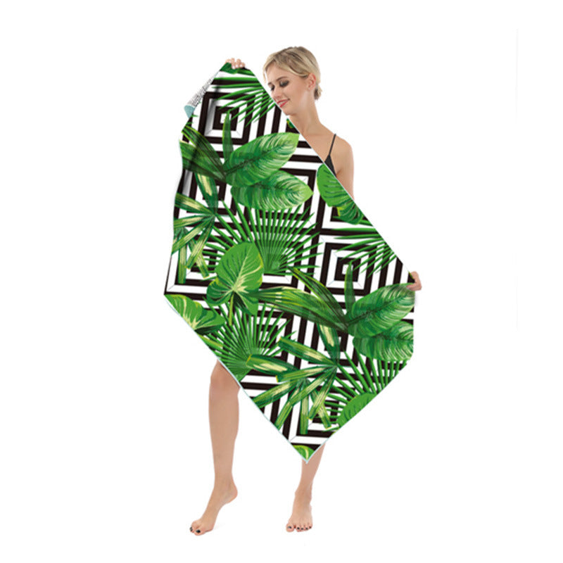 Strandhåndkle med moderne blad- og geometrisk design Skanto