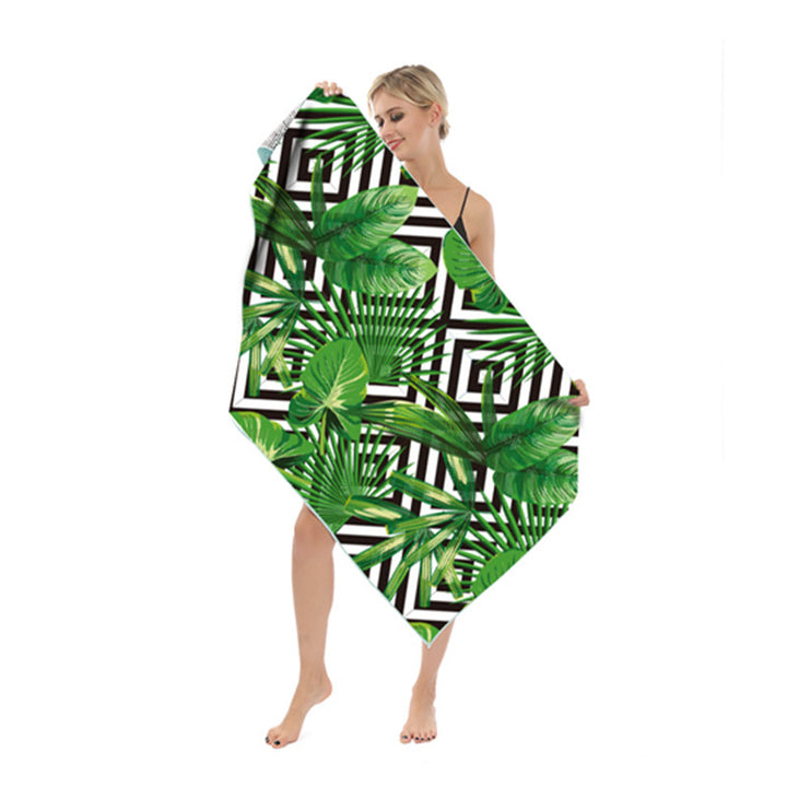 Strandhåndkle med moderne blad- og geometrisk design Skanto