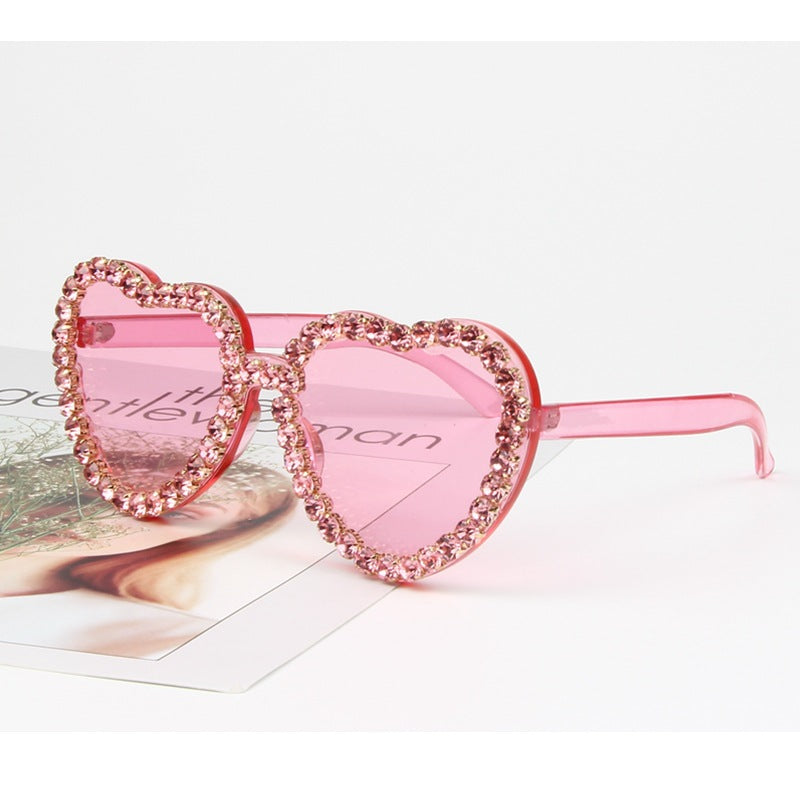 Dame hjerteformet solbrille med glitrende krystallramme Skanto