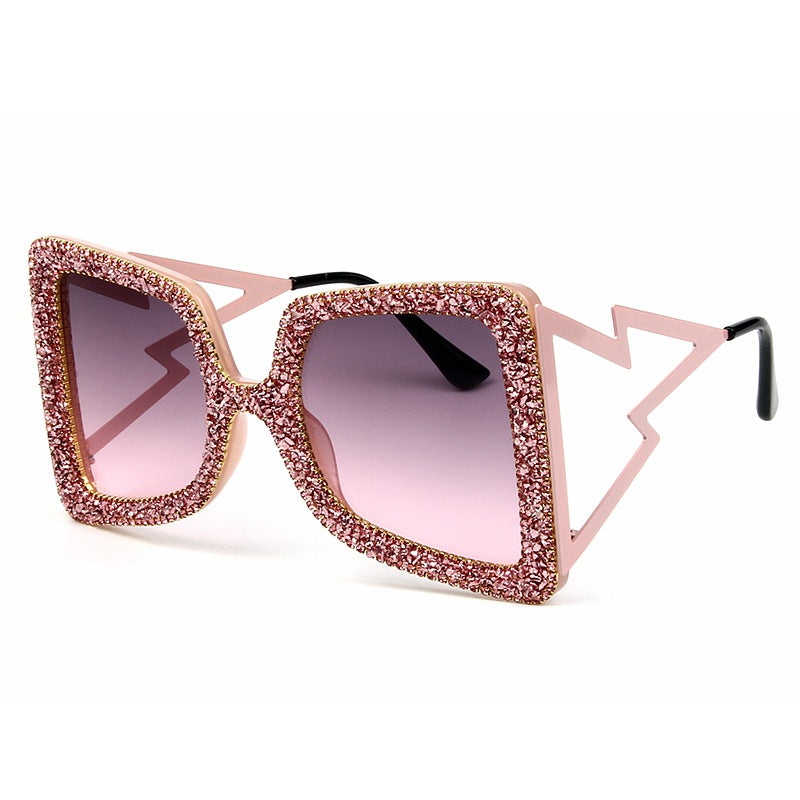 Dame overdimensjonert solbrille med glitrende krystallramme Skanto