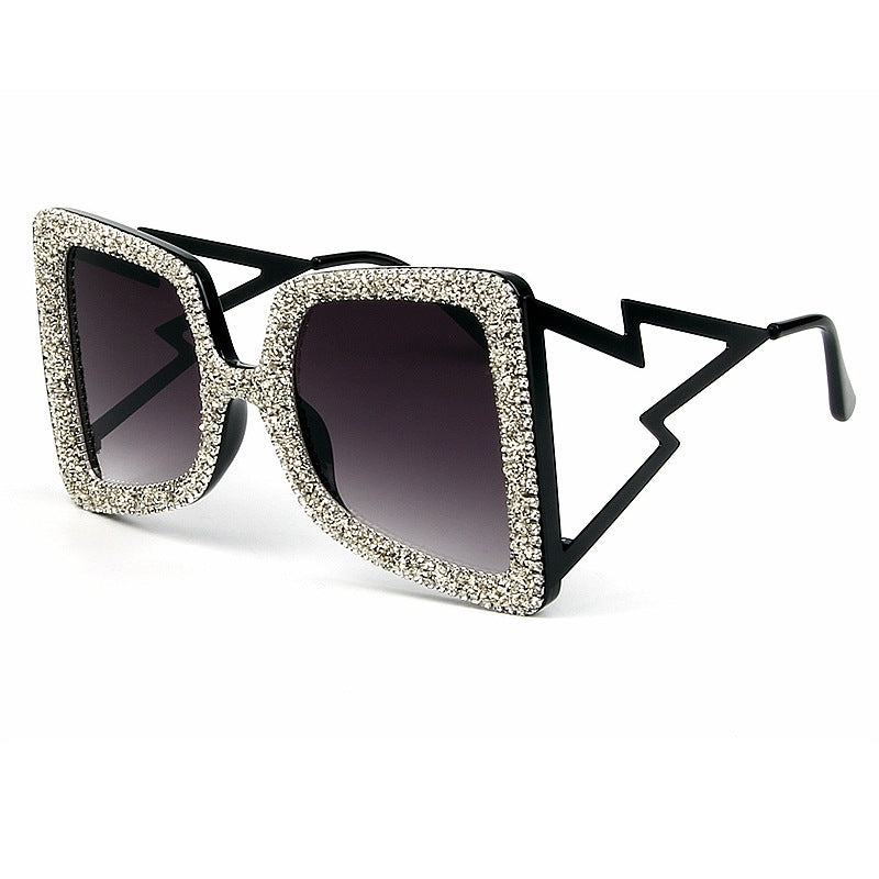 Dame overdimensjonert solbrille med glitrende krystallramme Skanto