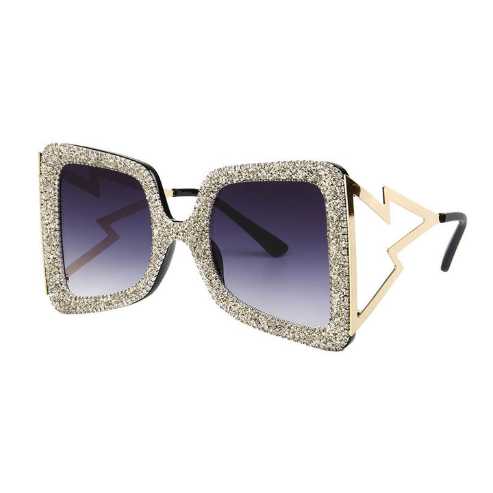 Dame overdimensjonert solbrille med glitrende krystallramme Skanto