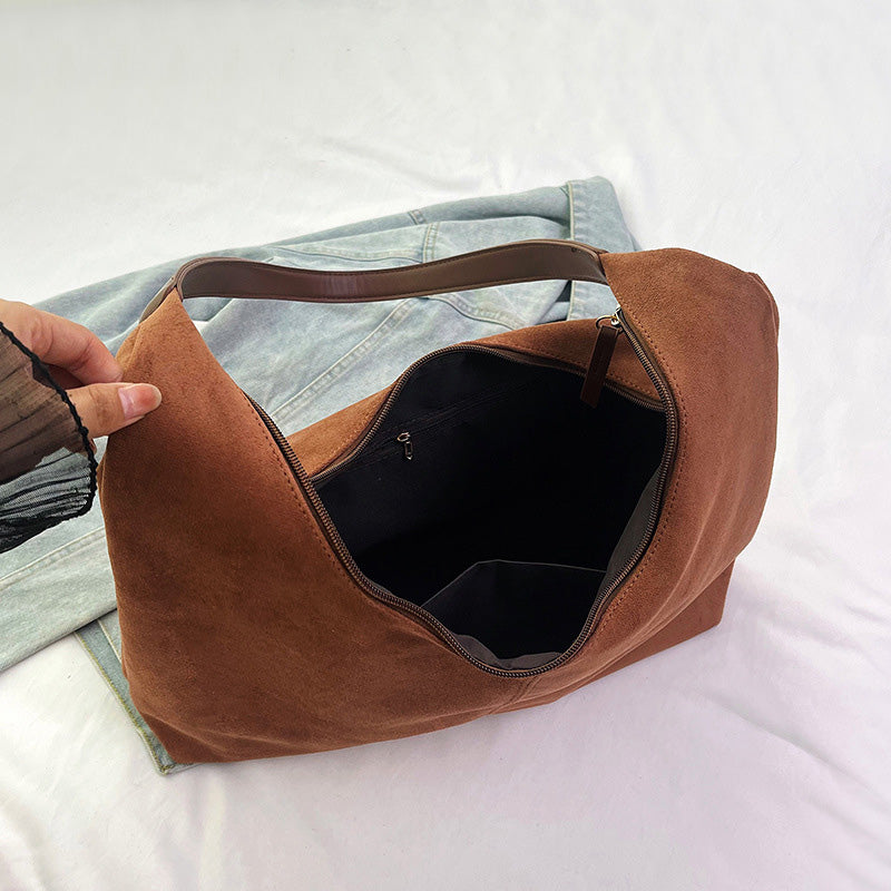 Skanto | Suede budveske med stor kapasitet