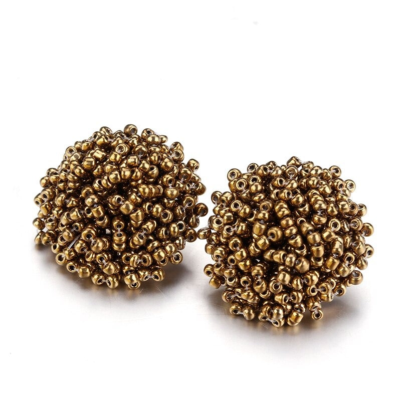 Skanto | Lys og morsom håndlaget multicolor perle pompom stud øredobber