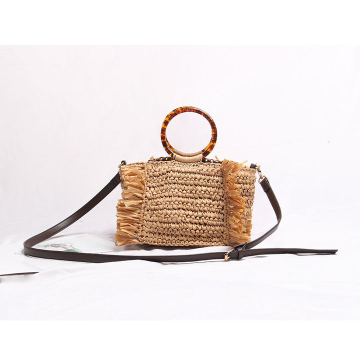 Håndlagd bast-crossbody-veske med fransedetaljer Skanto