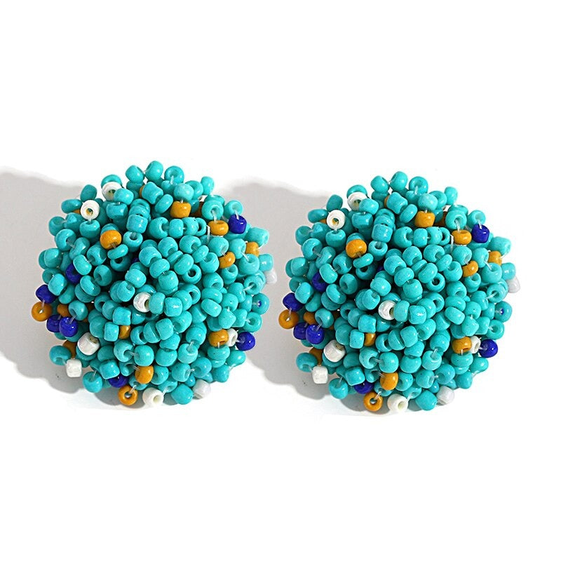 Skanto | Lys og morsom håndlaget multicolor perle pompom stud øredobber
