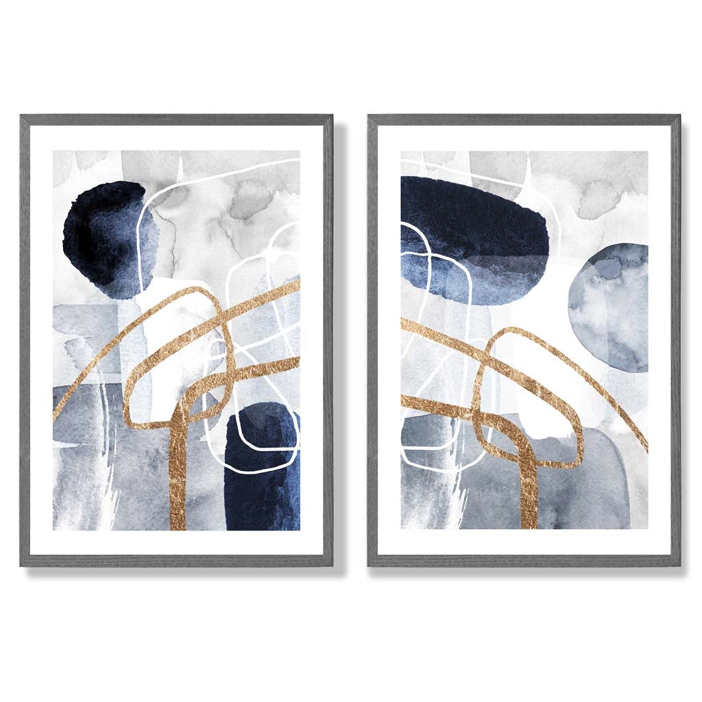 Sett med 2 kunsttrykk i abstrakt rammedesign i blått og gull