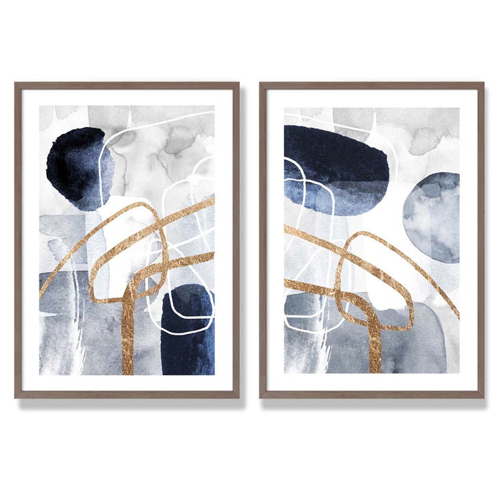 Sett med 2 kunsttrykk i abstrakt rammedesign i blått og gull