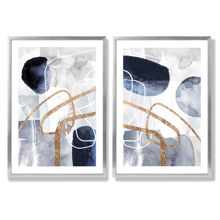 Sett med 2 kunsttrykk i abstrakt rammedesign i blått og gull