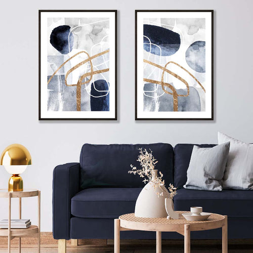 Sett med 2 kunsttrykk i abstrakt rammedesign i blått og gull