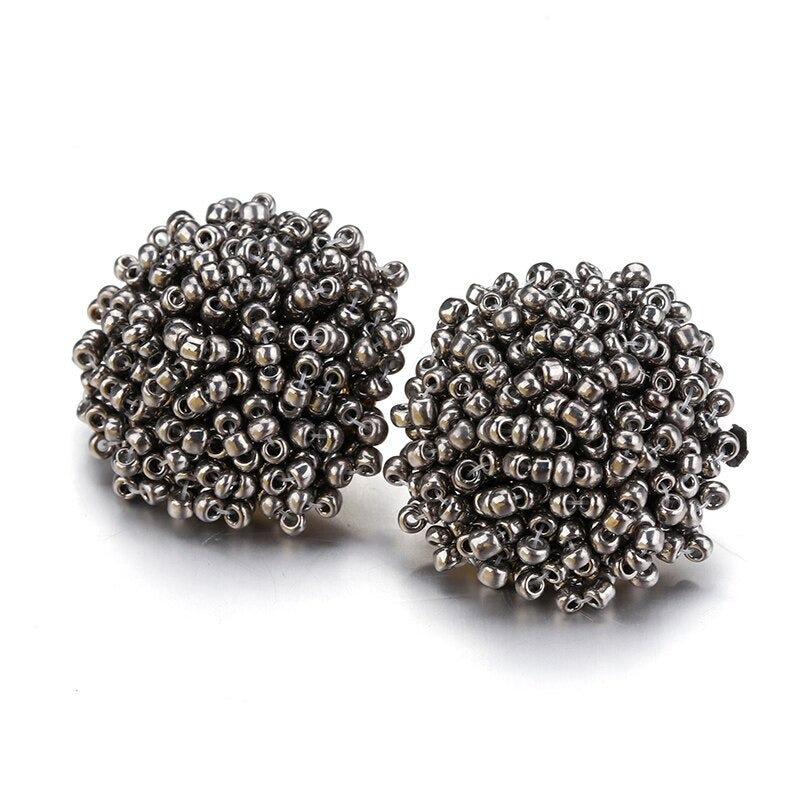 Skanto | Lys og morsom håndlaget multicolor perle pompom stud øredobber