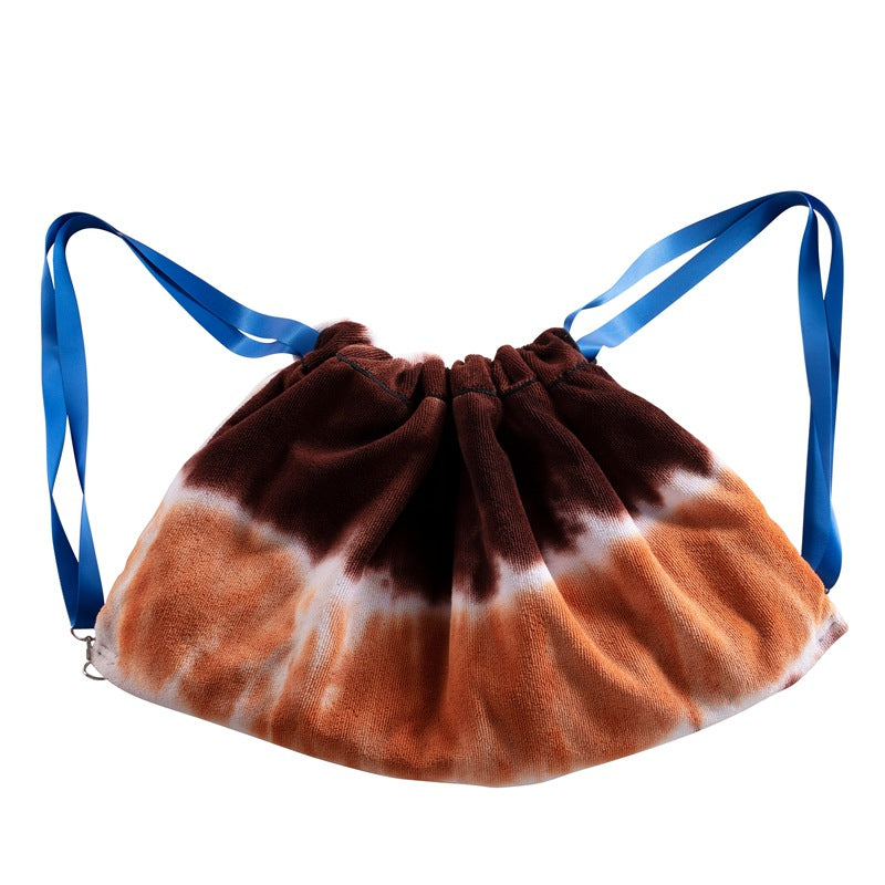 Lounge-stolpute med fargerikt tie-dye mønster Skanto