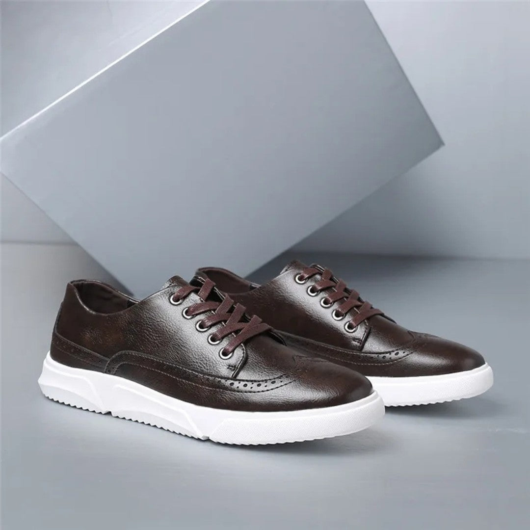 Brogue-sneakers i skinn med gummisåle