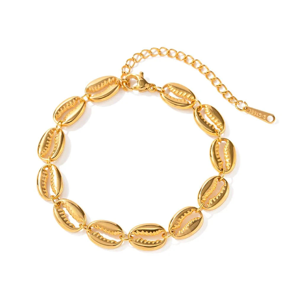 Skanto | 18k Delikat Cowrie Shell Armbånd