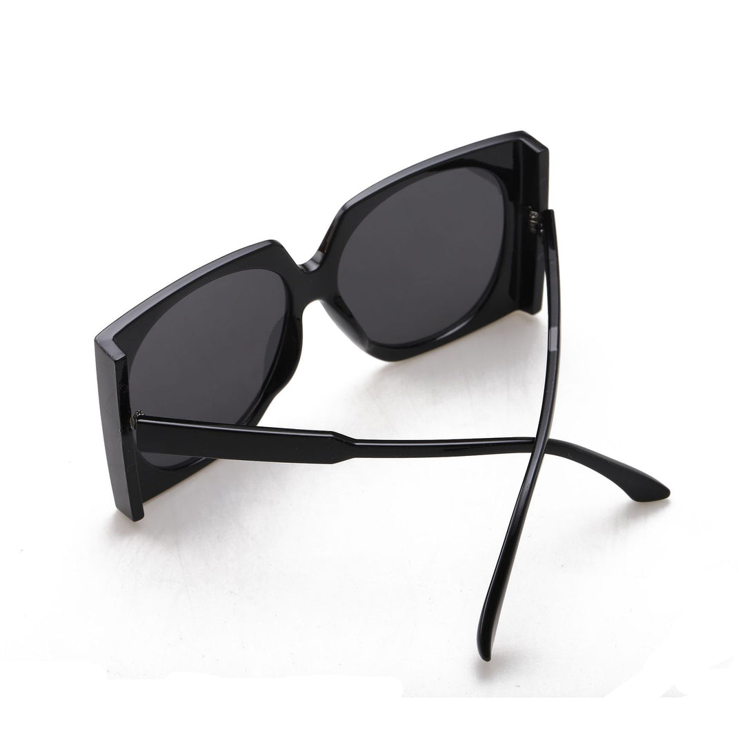 Dame Oversized solbriller i elegant ramme Skanto