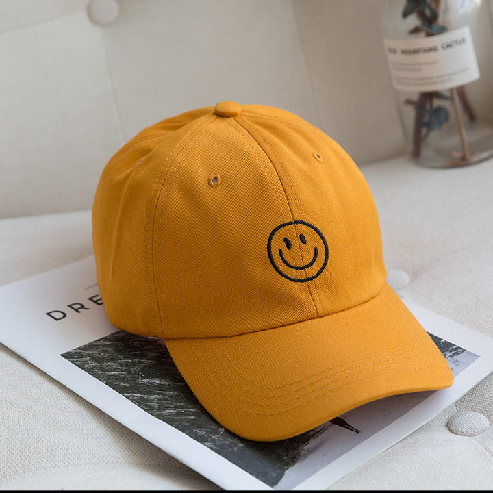 Kvinnenes justerbare smil brodert caps Skanto