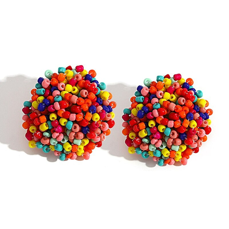 Skanto | Lys og morsom håndlaget multicolor perle pompom stud øredobber