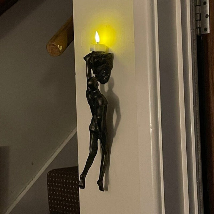 Skanto | Klatrevegg Henge Statuer