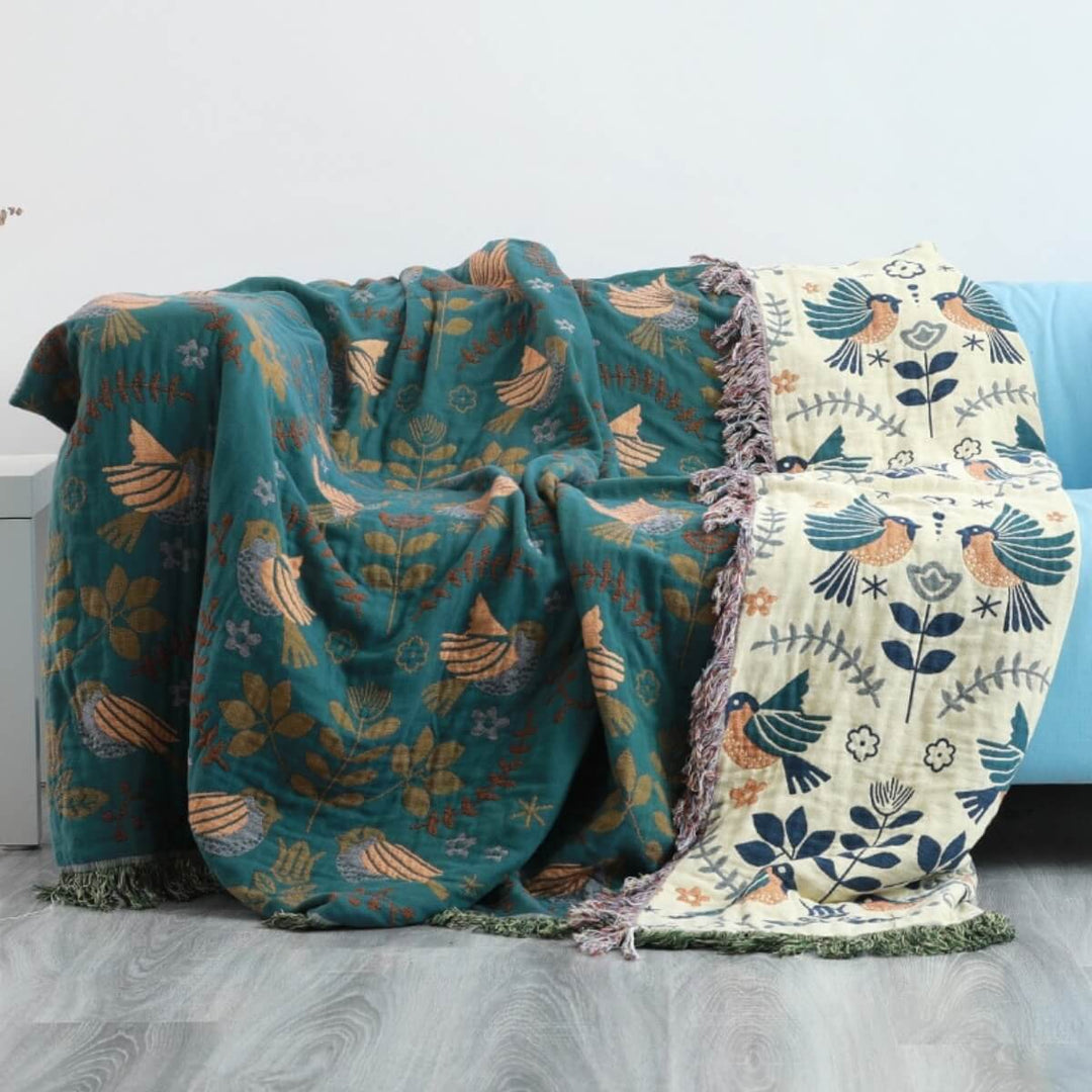 Skanto | Reversible Scandinavian bird plaid – Cozy and versatile for all seasons