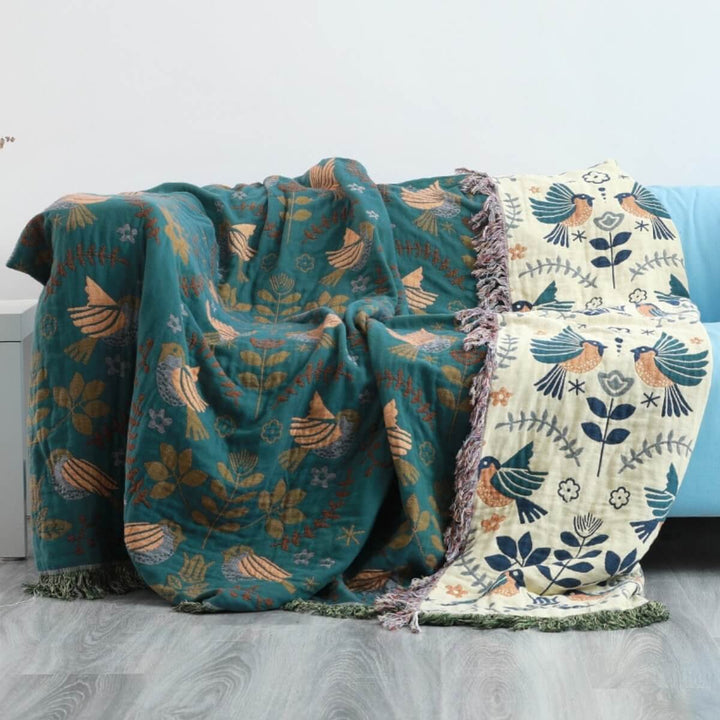 Skanto | Reversible Scandinavian bird plaid – Cozy and versatile for all seasons