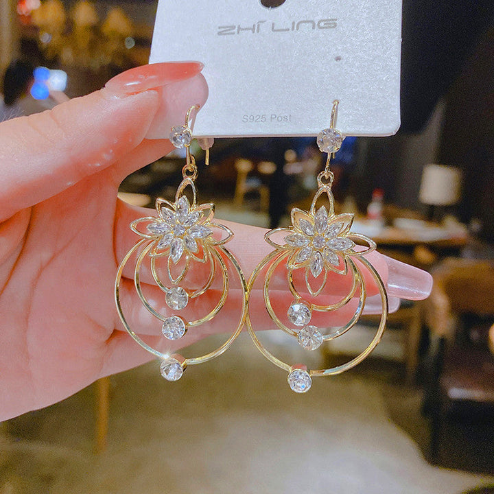 Crystal Lotus Tre Ringer Øredobber Skanto