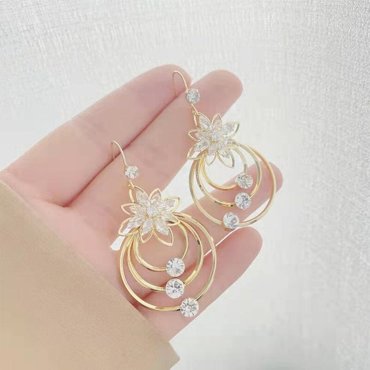 Crystal Lotus Tre Hoop Øredobber | Skanto