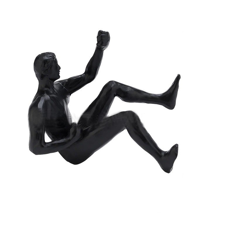 Skanto | Klatrevegg hengende statuer