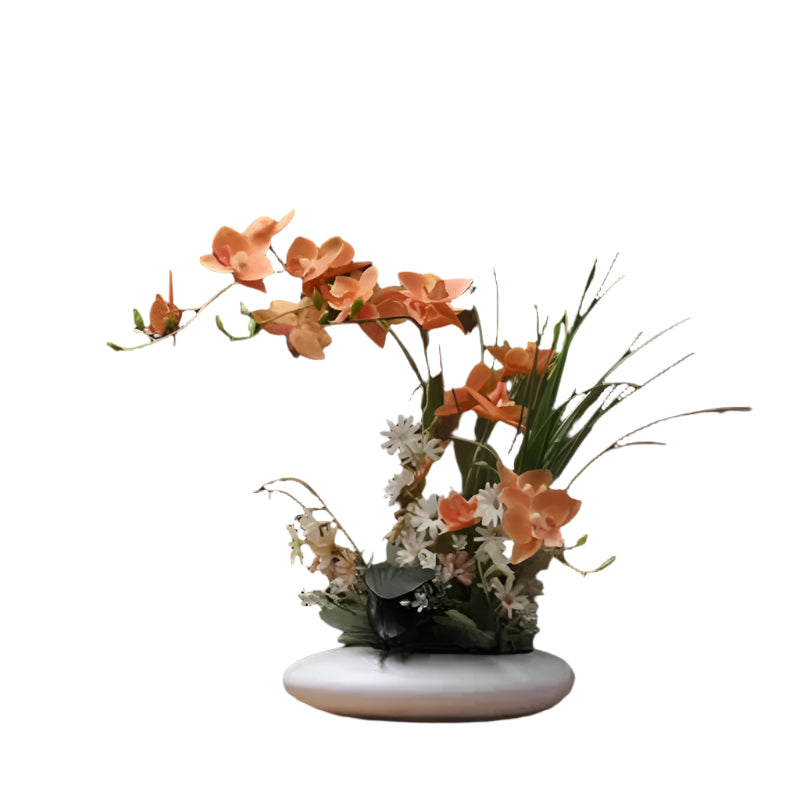 Livaktig blomsterarrangement i en moderne vase Skanto