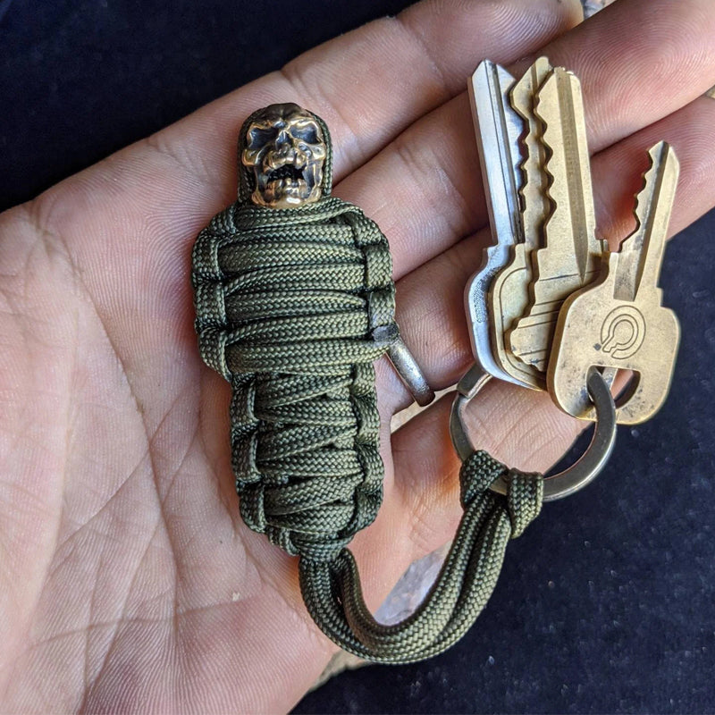 Skanto | Paracord nøkkelring mumie messing hodeskalle