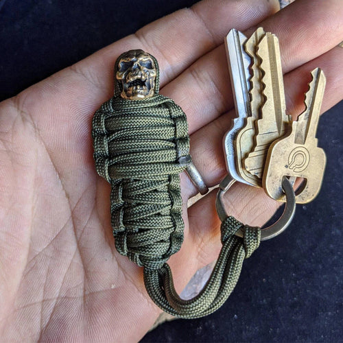 Skanto | Paracord nøkkelring mumie messing hodeskalle