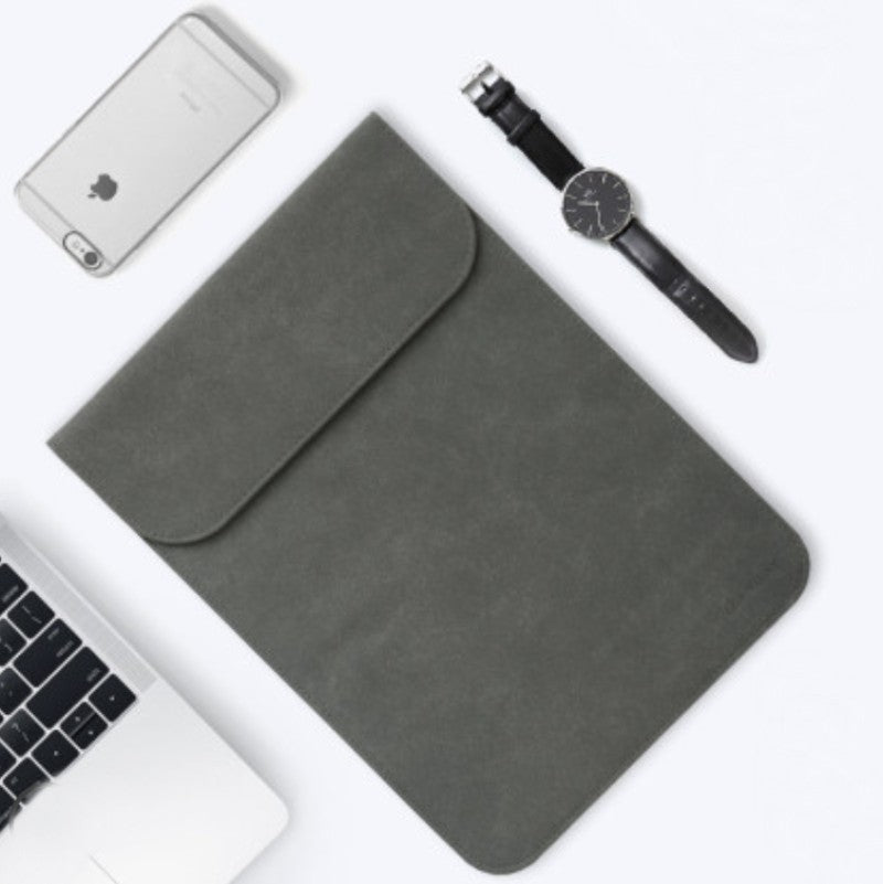 Skanto | Bærbar ultra-tynn laptophylse, med slank design, delikat fluff og usynlig magnetlås
