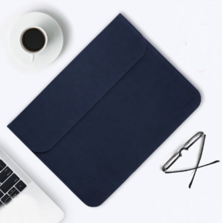 Skanto | Bærbar ultra-tynn laptophylse, med slank design, delikat fluff og usynlig magnetlås