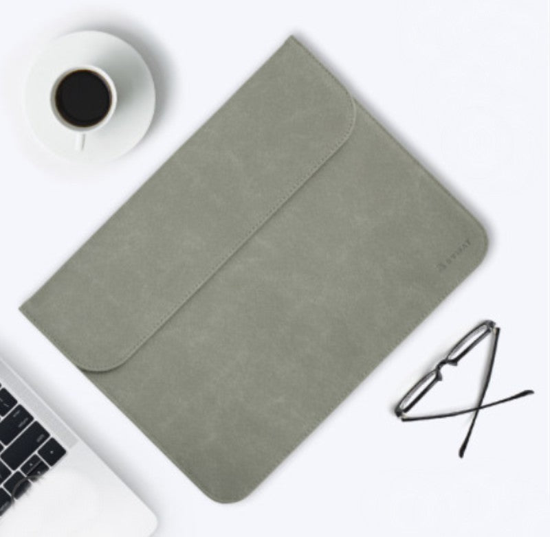 Skanto | Bærbar ultra-tynn laptophylse, med slank design, delikat fluff og usynlig magnetlås