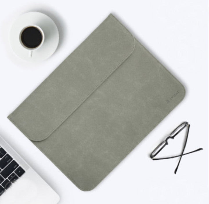 Skanto | Bærbar ultra-tynn laptophylse, med slank design, delikat fluff og usynlig magnetlås
