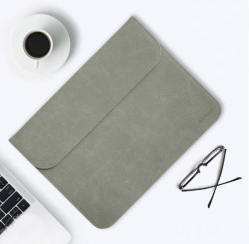 Skanto | Bærbar ultra-tynn laptophylse, med slank design, delikat fluff og usynlig magnetlås