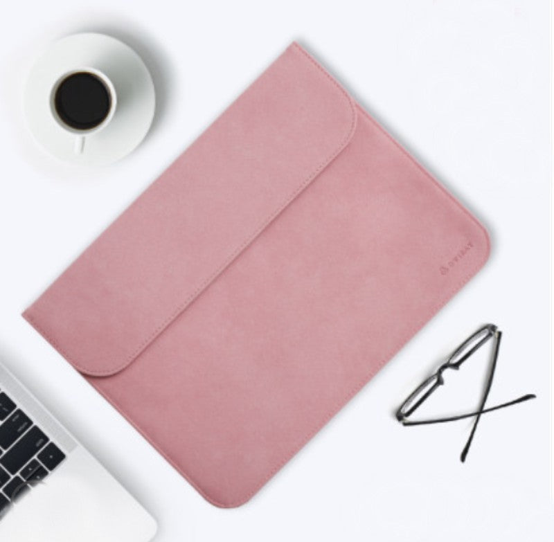 Skanto | Bærbar ultra-tynn laptophylse, med slank design, delikat fluff og usynlig magnetlås