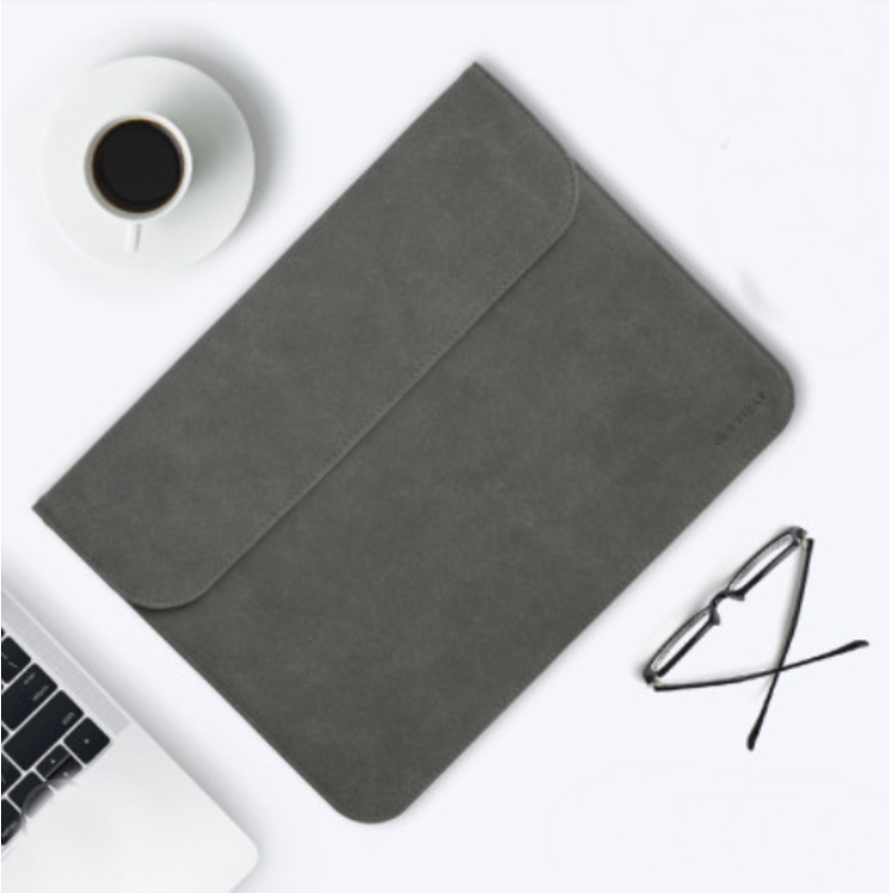 Skanto | Bærbar ultra-tynn laptophylse, med slank design, delikat fluff og usynlig magnetlås