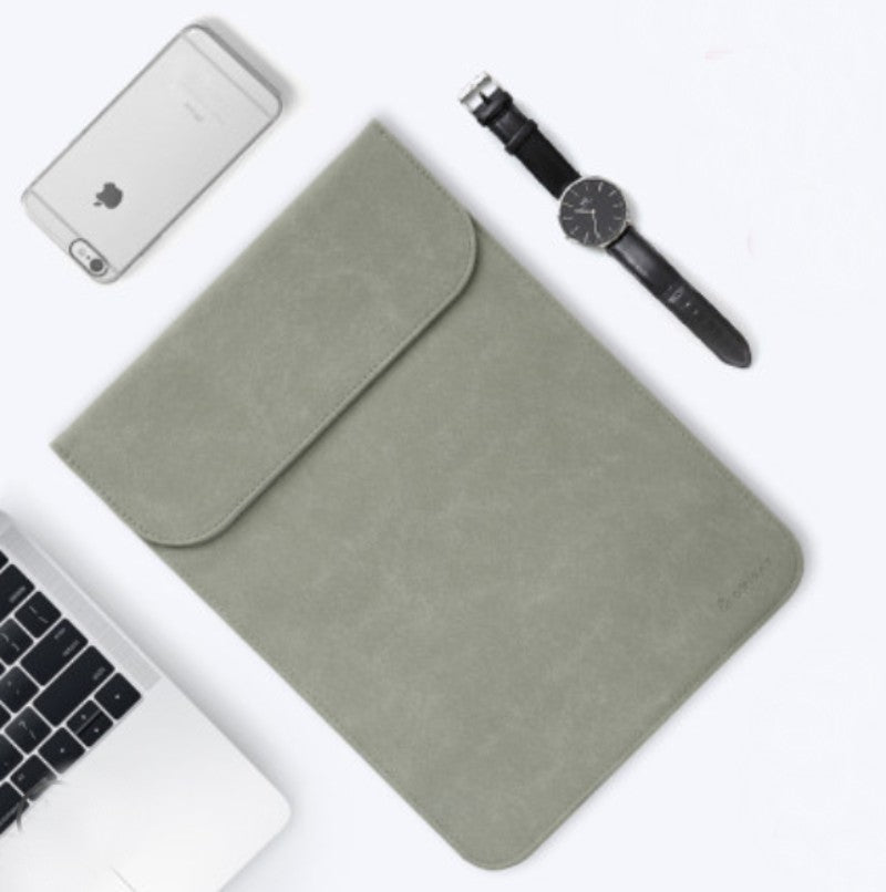 Skanto | Bærbar ultra-tynn laptophylse, med slank design, delikat fluff og usynlig magnetlås