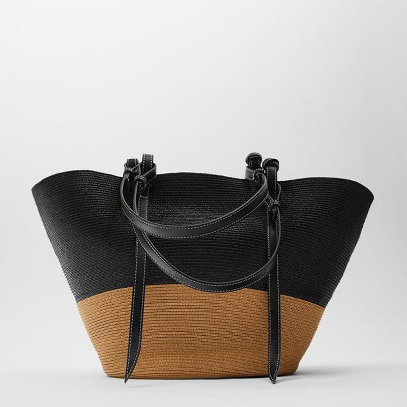 Generøs kurvveske med elegante lærdetaljer Skanto