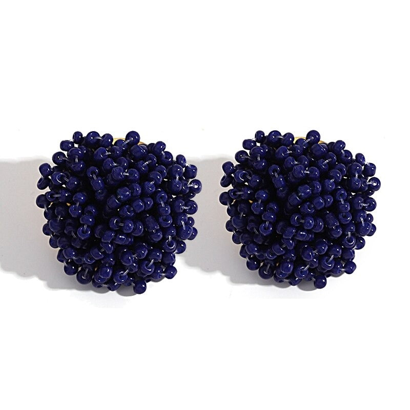 Skanto | Lys og morsom håndlaget multicolor perle pompom stud øredobber