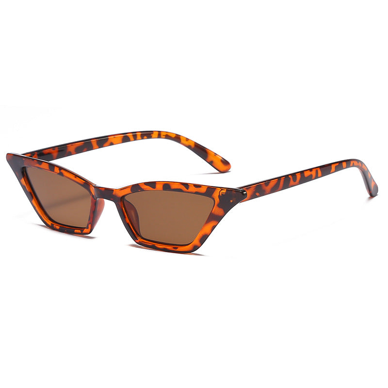 Dame geometrisk solbrille i trendy skjolddesign Skanto