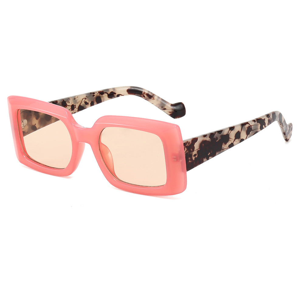 Dame moteristisk kvadratisk solbrille med gjennomsiktig design Skanto